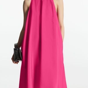 High neck sleeveless dress.   Relaxed fit.new. Never worn.